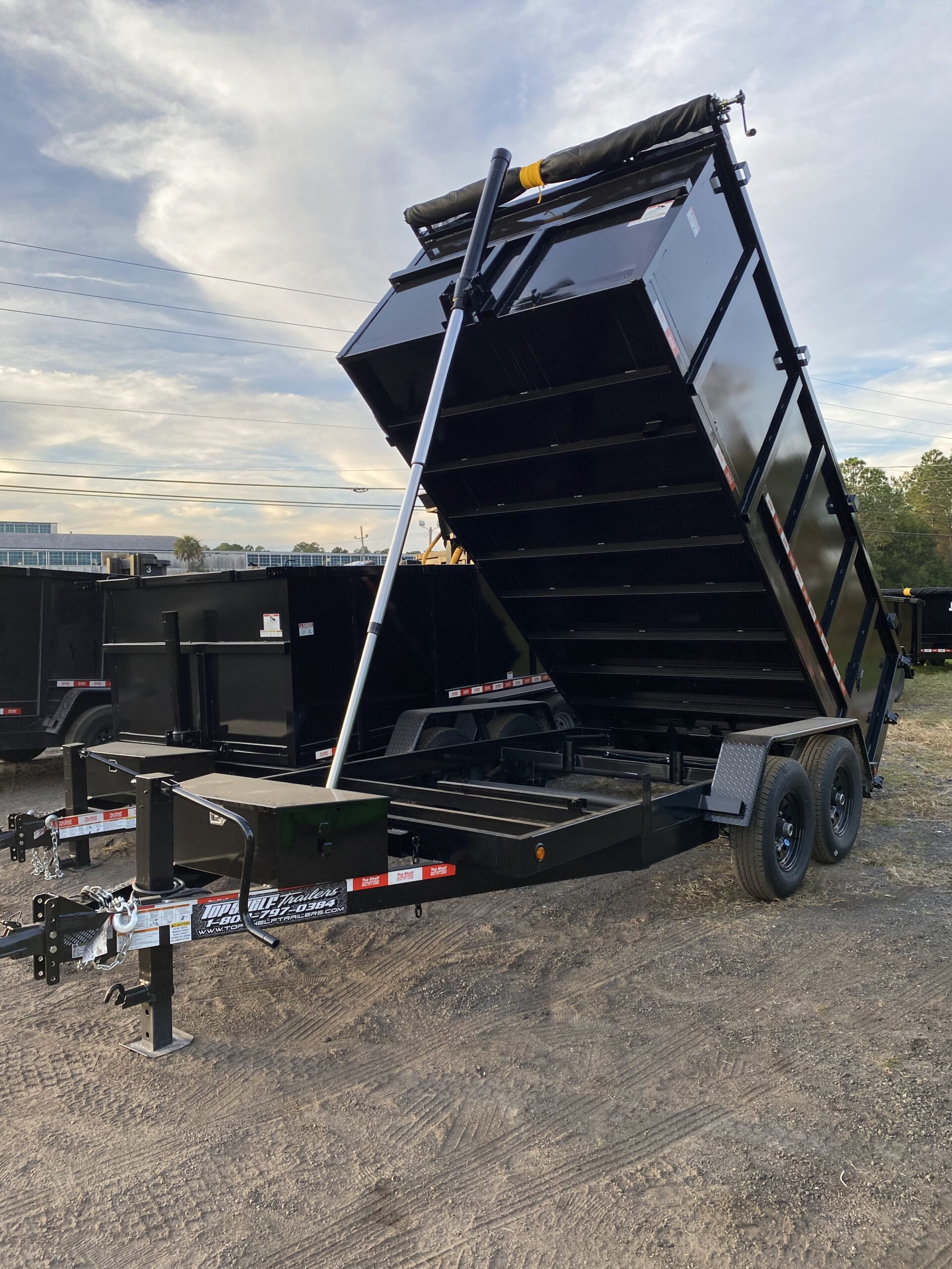 heavy duty dump trailer with telescopic lift built by Top Shelf Trailers